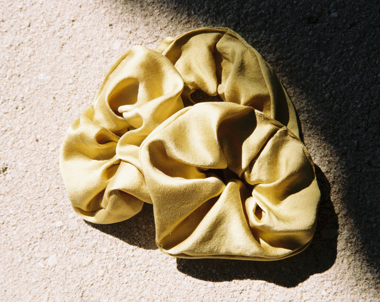 Three light green silk scrunchies