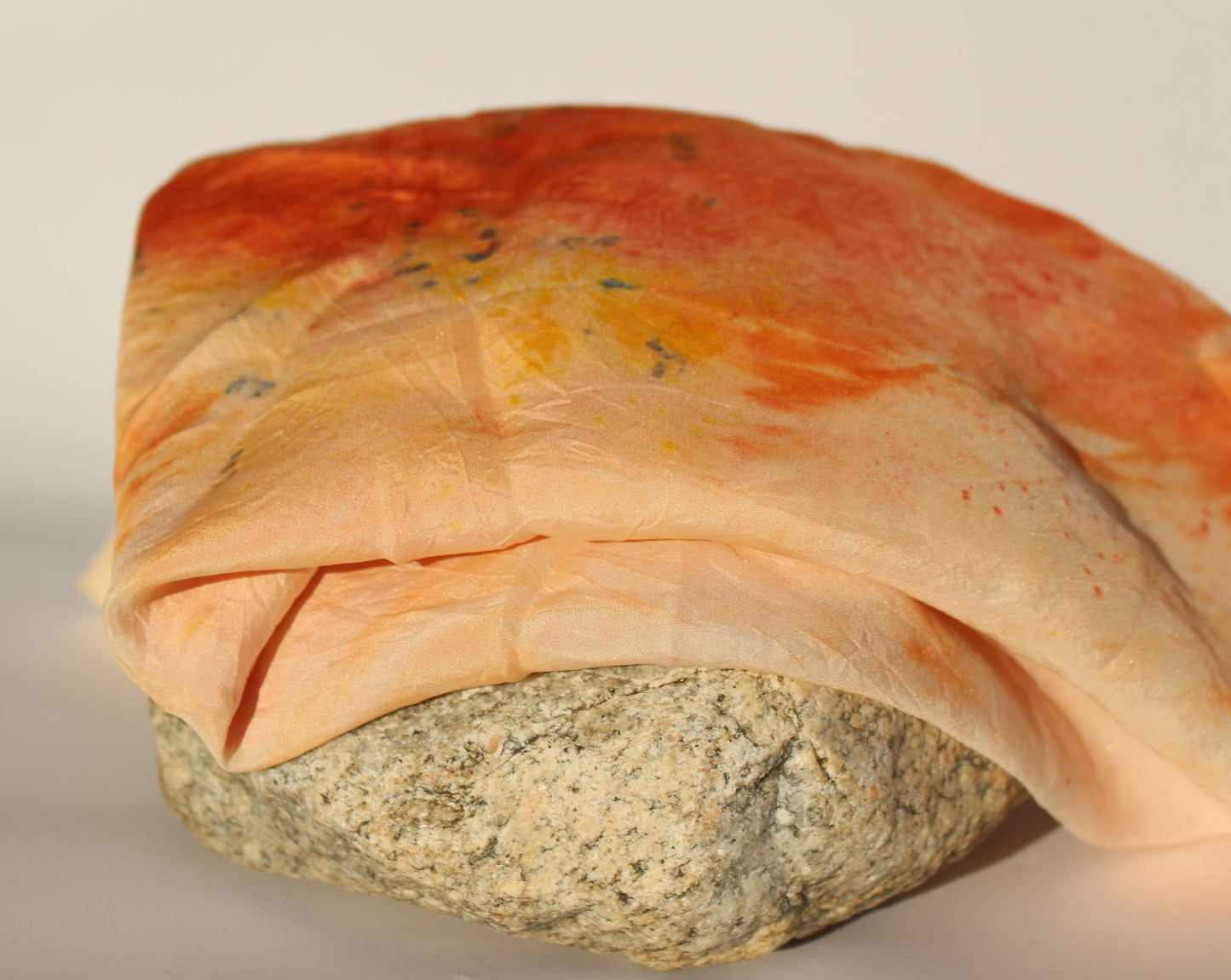 Orange colored silk scarf
