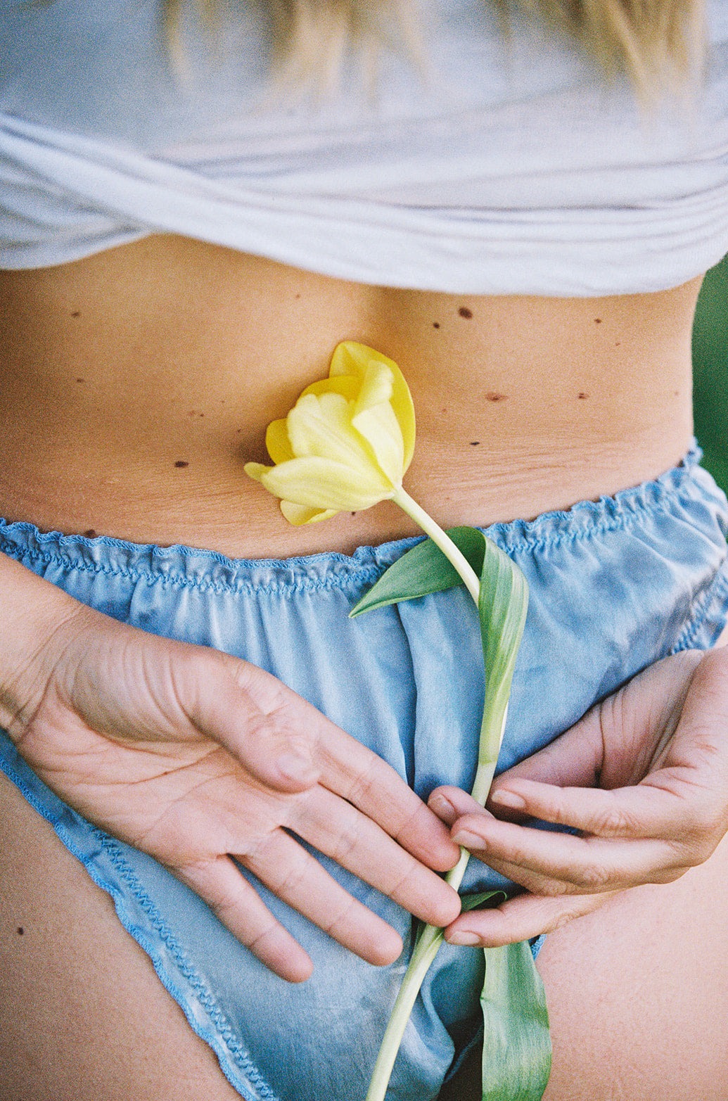 Indigo blue silk woman's underwear with a yellow flower