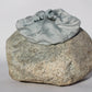 Blue silk scrunchie on a rock