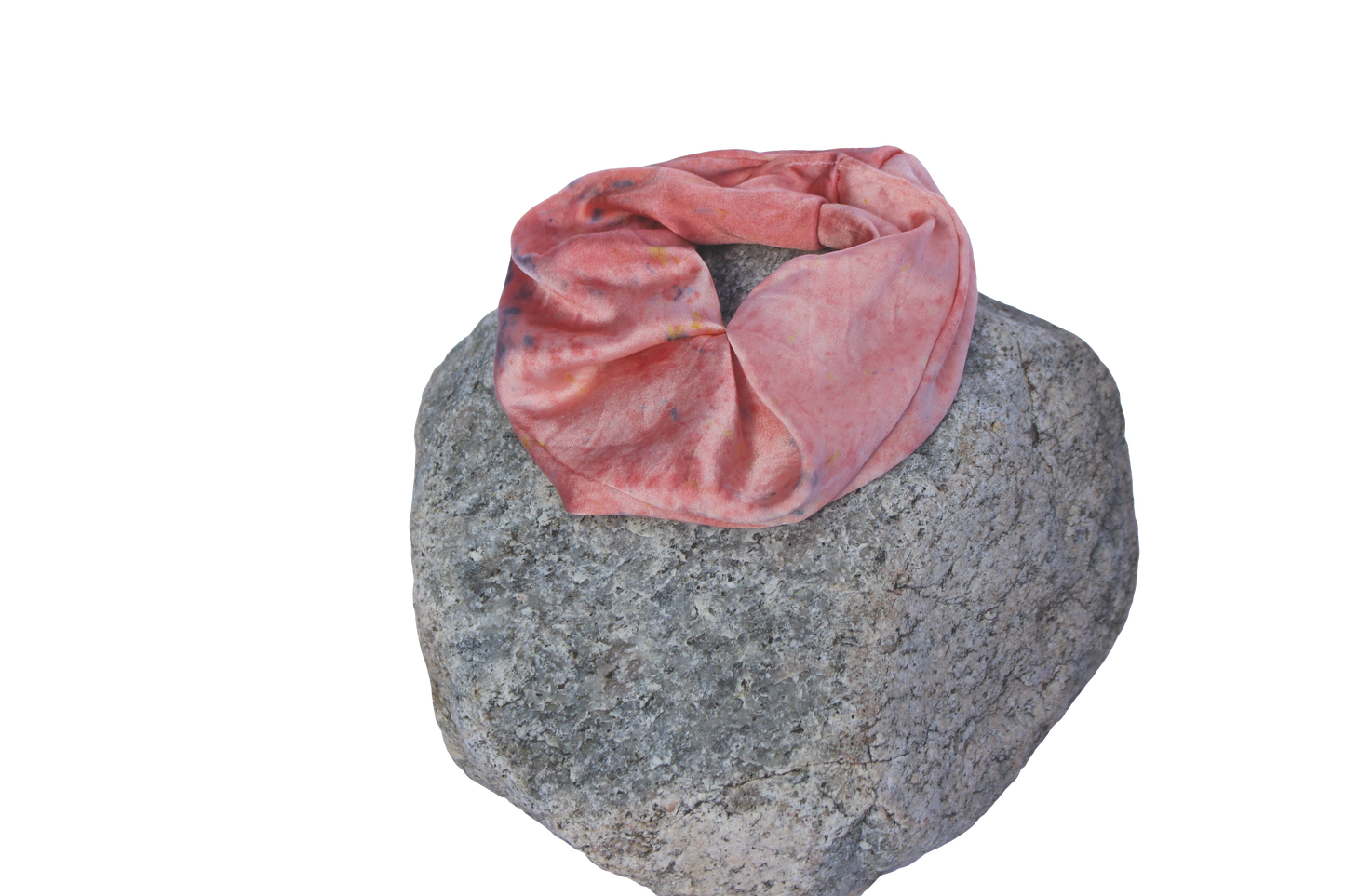 Pink silk scrunchie on a rock