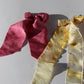 Pink and yellow silk bows